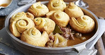 Coq au vin with garlic croissant puffs