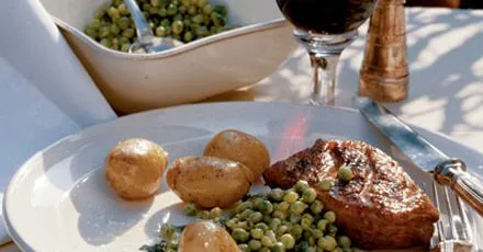 Grilled duck breast with minted peas
