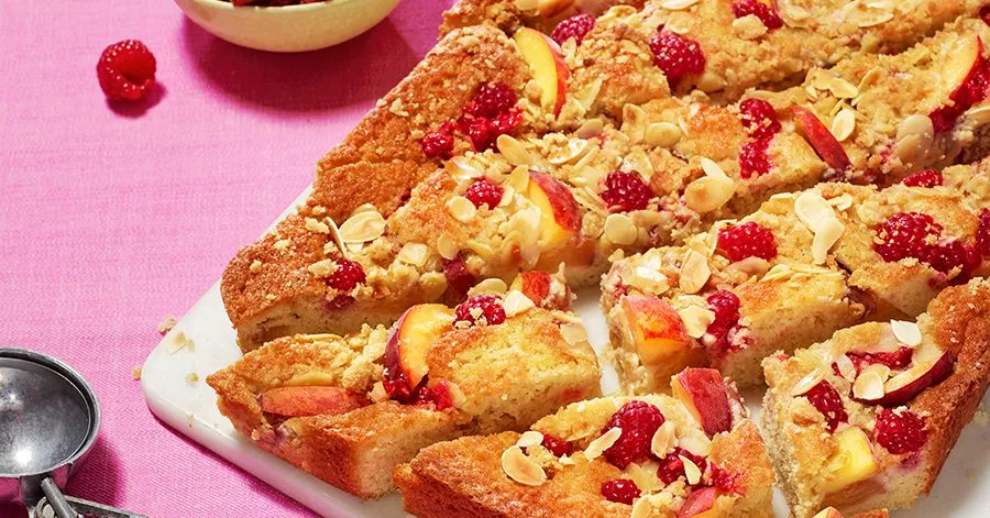 Peach & raspberry almond crumble cake