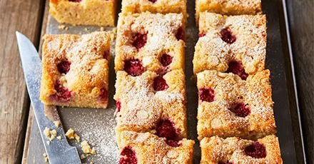 Raspberry & white chocolate financier traybake