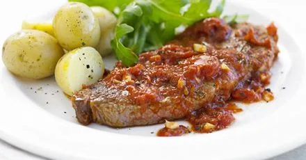 Стейки вирізки з піцайола соусом