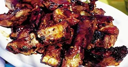Sizzling spare ribs with BBQ sauce