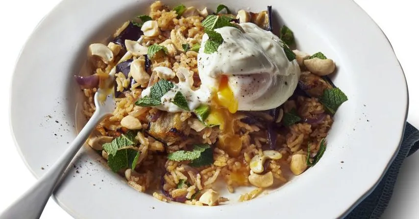 Spiced aubergine pilaf with poached eggs