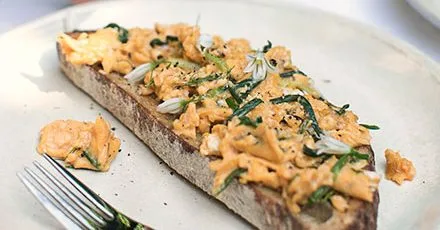 Three-cornered leek & scrambled eggs on toast